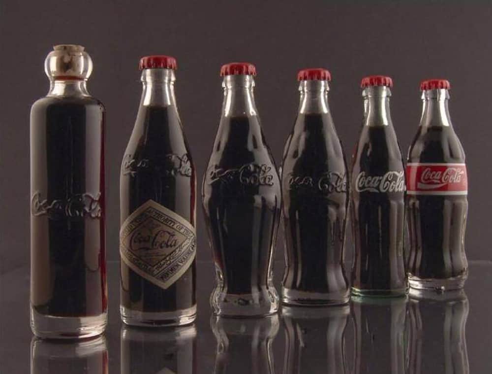 可口可乐瓶设计的历史: 1899, 1900, 1915, 1916 和1957-深圳VI设计，VI设计公司，标志设计公司